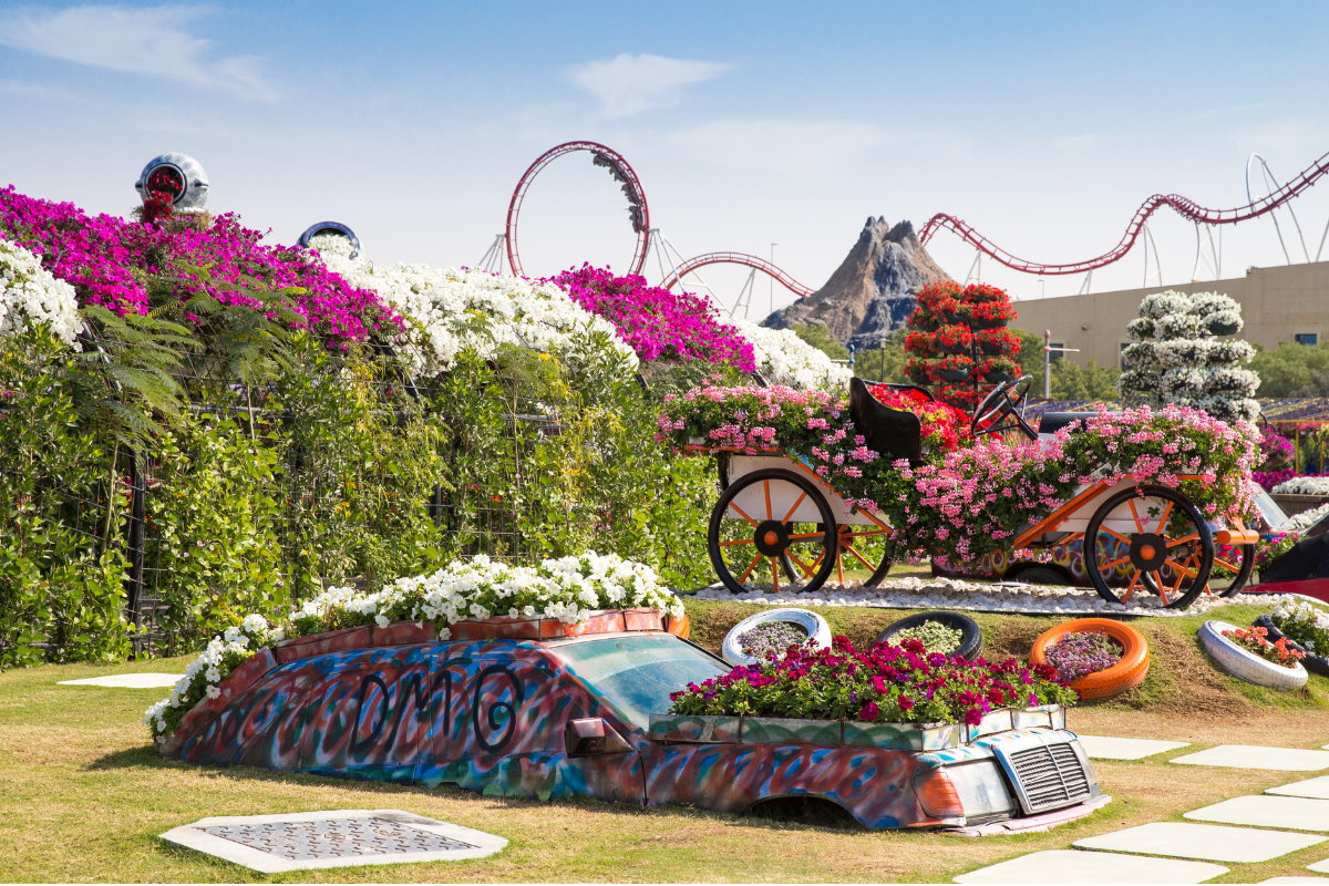 Floral vintage car and flower cart displays at Dubai Miracle Garden