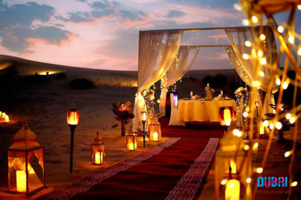Sunset over the red dunes of Dubai desert