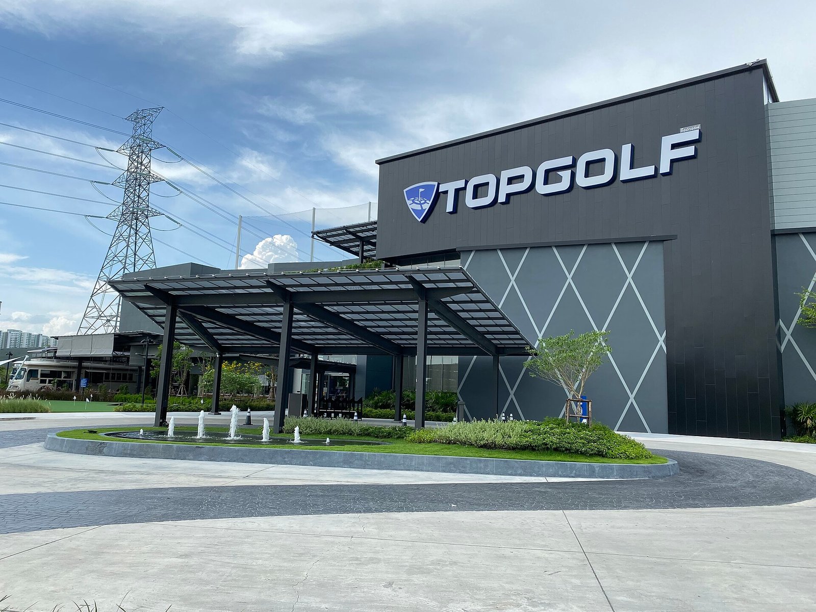 Front of a Topgolf venue in the daytime