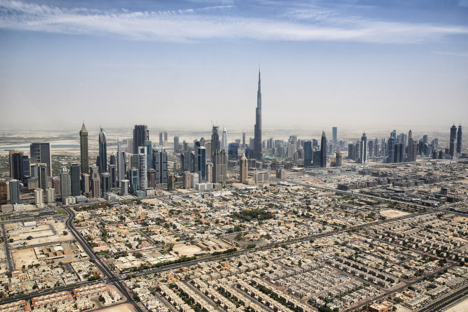 Daytime panorama of the Dubai skyline with the Burj Khalifa, seen from the air