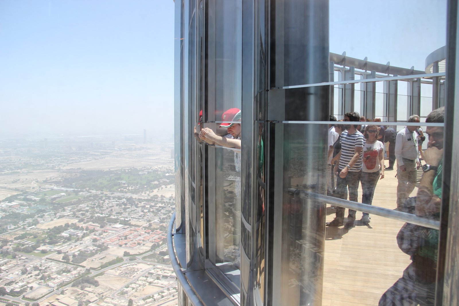 Visitors on the Level 124 outdoor terrace of the Burj Khalifa, high above Dubai