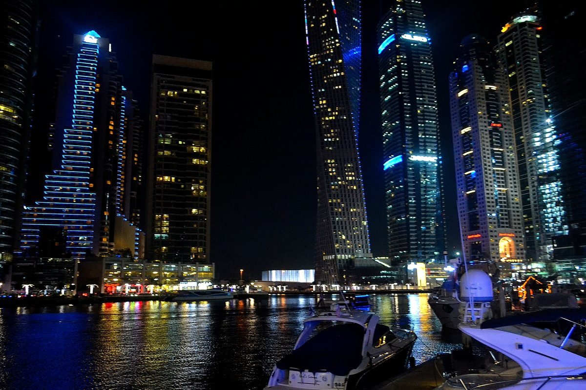 The Dubai Marina skyline lit up at night, the view that turns a marina cruise into a full evening out