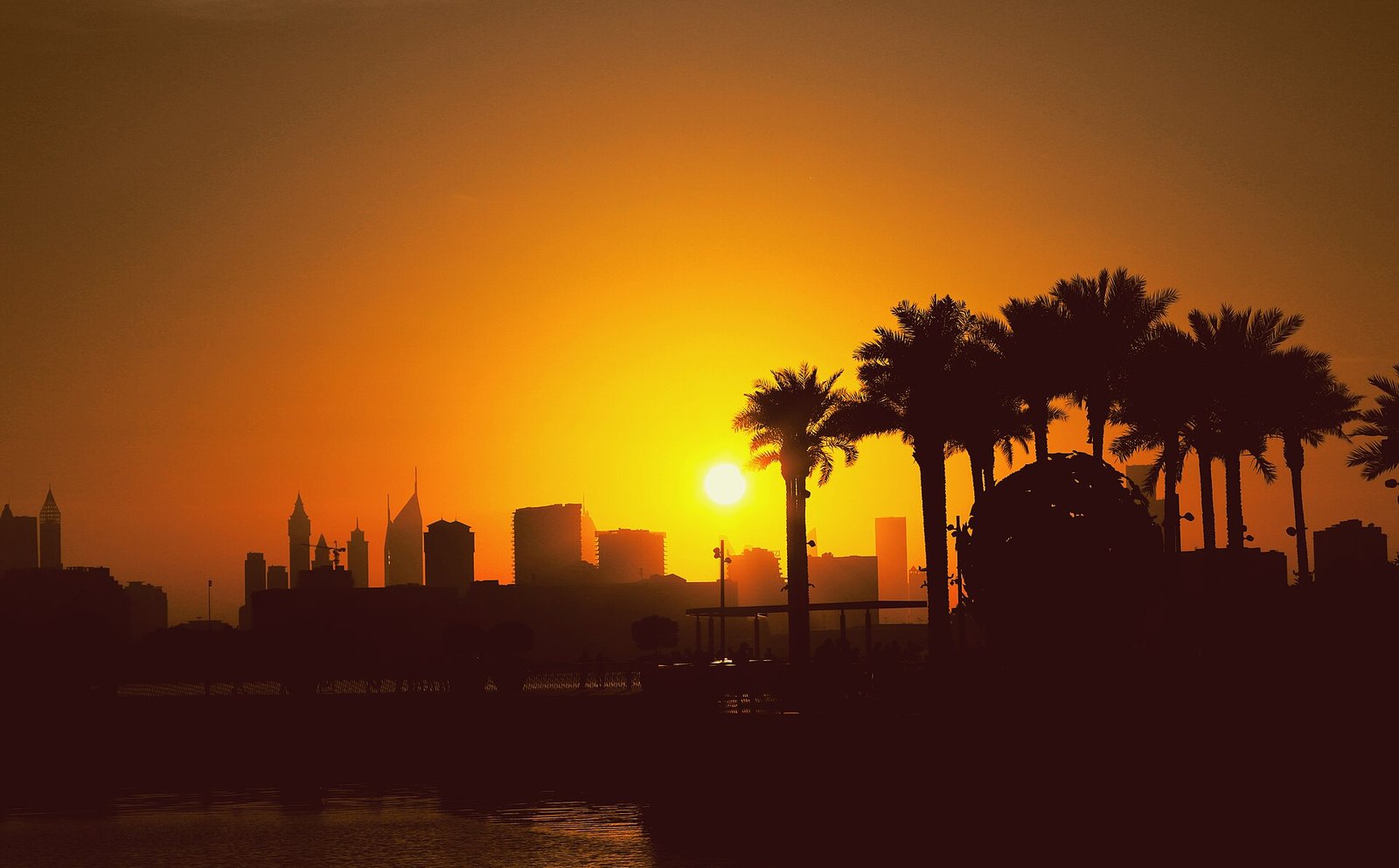 Dubai Creek Harbour skyline at dusk across Dubai Creek