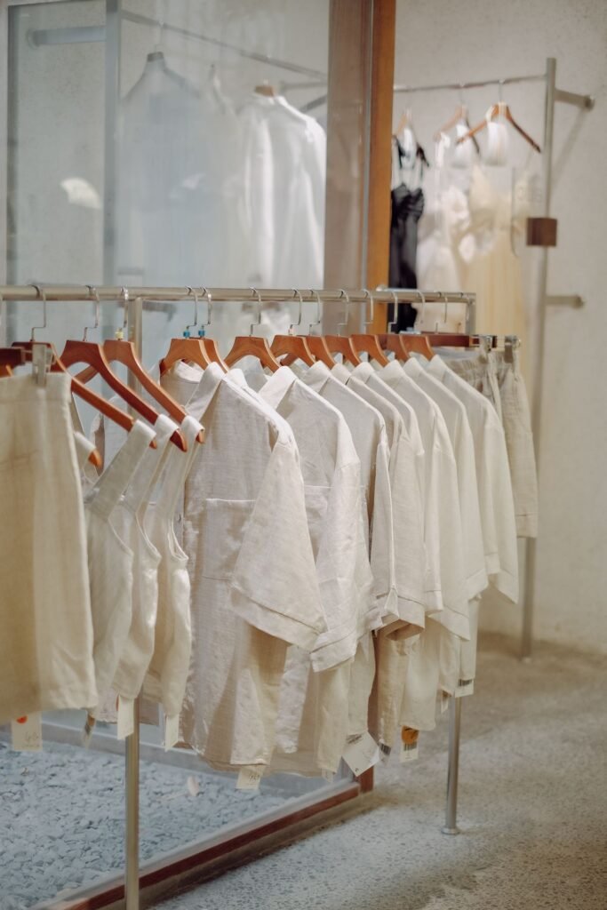 Clothing rack with discounted brand clothes at an outlet store