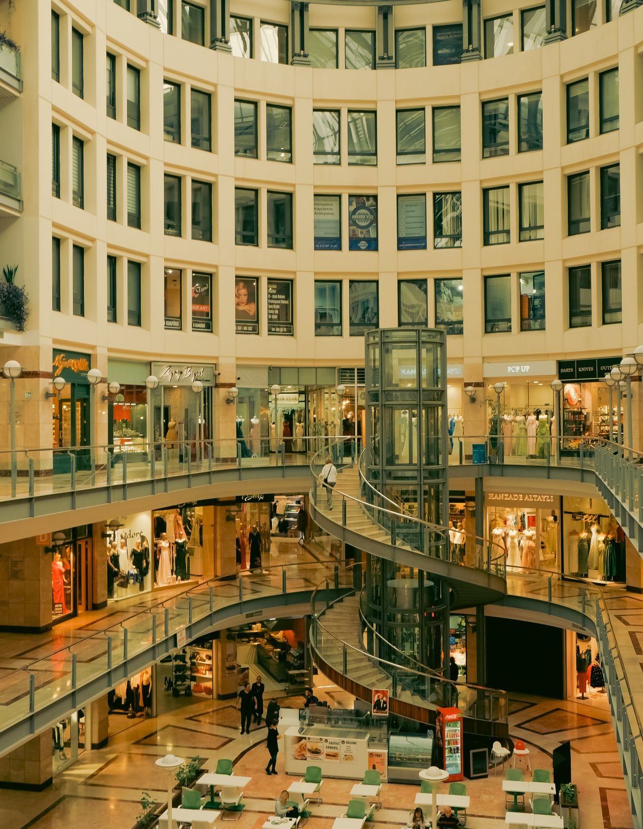 Dubai outlet mall shopping atrium with brand stores on every level