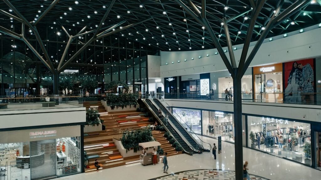 Spacious hall of an outlet mall in Dubai during opening hours